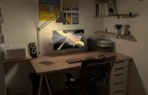 a desk with a computer and a lamp